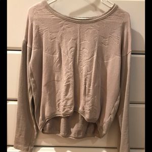 A light grey/purple long sleeve